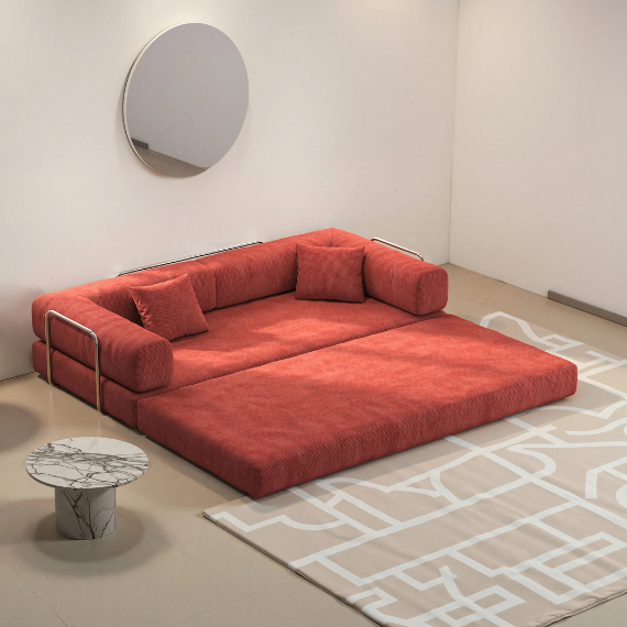 Sofá cama modular rojo extendido en salón moderno